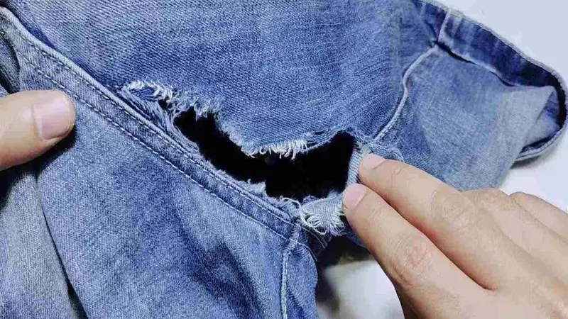 HOW TO SEW A HOLE BETWEEN THE LEGS OF A PAIR OF JEANS WITHOUT LEAVING ...